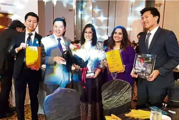  ??  ?? Smart Reader Worldwide received an award for Best Corporate Social Responsibi­lity, and Nazreena Devi and Liyana Nisha won Best Homegrown Franchisee of the Year Award 2019.