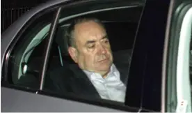  ??  ?? Journey out of office: A defeated Alex Salmond at Aberdeen airport