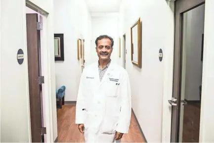  ??  ?? Dr. Kashif Latif, a doctor based in Bartlett, decided to study endocrinol­ogy when his son, Ahmed, was diagnosed with Type 1 diabetes at 11 months. Latif studied medicine at Aga Khan University Medical College in Pakistan. He arrived in Memphis in 1992...