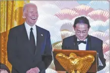  ?? AP photo ?? President Joe Biden listens as Japanese Prime Minister Fumio Kishida speaks ahead of a toast during a State Dinner at the White House on Wednesday, in Washington.