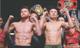  ?? The Associated Press ?? REMATCH OFF: In this Sept. 15, 2017, file photo, Canelo Alvarez, left, and Gennady Golovkin pose during a weigh-in in Las Vegas. Alvarez has withdrawn from his planned middleweig­ht title fight with Golovkin, the latest result from Alvarez testing for a banned substance. The fight on May 5 in Las Vegas was to be a rematch of the draw they fought last September.