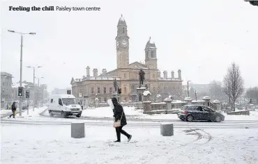  ??  ?? Feeling the chill Paisley town centre