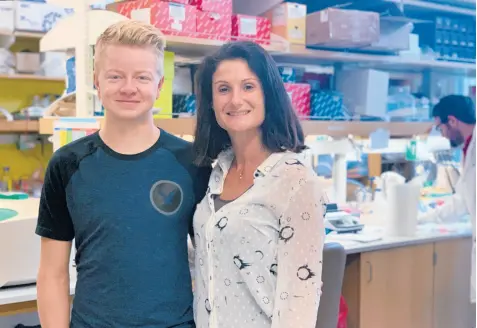  ??  ?? Stephanie Cherqui and patient Jordan Janz stand together in her California research lab.