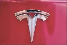  ?? RICHARD VOGEL THE ASSOCIATED PRESS ?? The Canadian arm of Tesla Inc. claims the U.S. company has been treated unfairly in the cancellati­on of an electric vehicle rebate program.