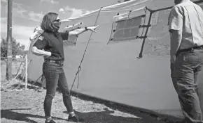  ?? AP FILE ?? Oregon Gov. Kate Brown, left, visits the Bly Fire Camp, on the southern edge of a wildfire, in June in Klamath County, Ore.