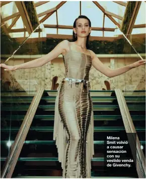  ??  ?? Milena
Smit volvió a causar sensación con su vestido venda de Givenchy.