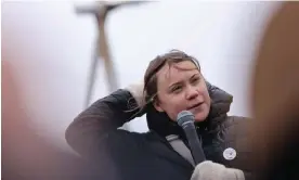  ?? Photograph: Thilo Schmülgen/ ?? Greta Thunberg speaks during a protest against the expansion of RWE's Garzweiler opencast lignite mine in Lützerath, Germany, on 14 January.