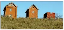  ??  ?? Camp houses dot the countrysid­e of Madagascar’s interior. The simple dwellings are used by farmers.