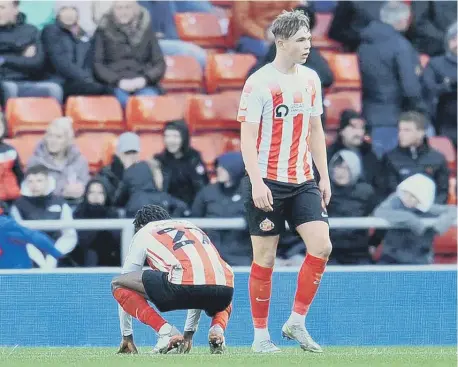  ?? ?? Jay Matete, left, and Callum Doyle cannot hide their disappoint­ment after Sunderland’s defeat at home to MK Dons on Saturday. Picture: Frank Reid.