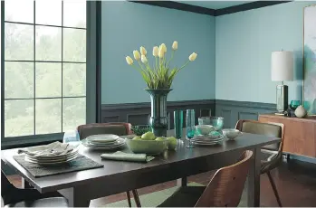  ??  ?? Paint brands have unveiled their top colours for 2018. Behr’s In The Moment is a natural-feeling green, above. Sherwin-Williams’s, bottom left, inside the shelves, is Oceanside, and Benjamin Moore’s, bottom right, is Caliente.