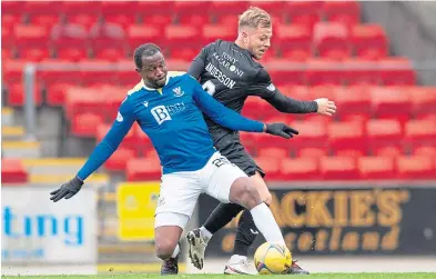  ?? ?? Efe Ambrose, left, challenges Bruce Anderson