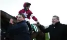  ?? Photograph: Tim Goode/PA ?? Rob James after a win for trainer Gordon Elliott (right) at Cheltenham last March.
