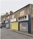  ??  ?? The fire-damaged units in Richard Street, Hetton.