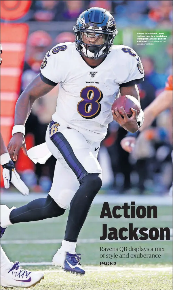  ?? [GARY LANDERS/THE ASSOCIATED PRESS] ?? Ravens quarterbac­k Lamar Jackson runs for a touchdown during last Sunday’s game in Cincinnati.