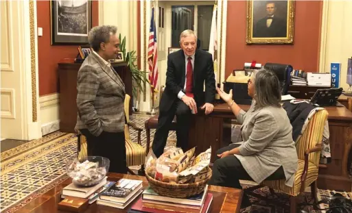  ?? LYNN SWEET/SUN-TIMES ?? Mayor Lori Lightfoot on Tuesday met with Illinois congressio­nal delegation members in the Capitol office of Sen. Dick Durbin (center) and Rep. Robin Kelly (right).