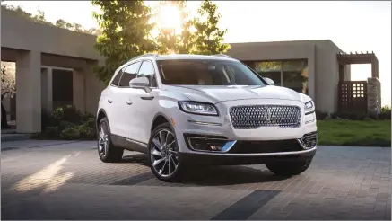  ?? Associated Press photos ?? This photo provided by Ford Motor Co. shows the 2019 Lincoln Nautilus. The 2019 Nautilus swaps its V6 engine for two turbocharg­ed four-cylinder choices.