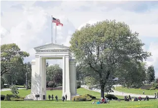  ?? ELAINE THOMPSON THE ASSOCIATED PRESS FILE PHOTO ?? The U.S. and Canada border in Peace Arch Park in Blaine, Wash. The U.S. decision to freeze certain employment visas gives Canada an opportunit­y to win back some workers it loses.