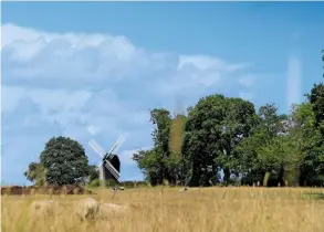  ??  ?? WINDMILLS AND WALLED GARDENS
A post mill crowns the skyline near Rolvenden. Not far away, the trail passes Great Maytham Hall, which inspired Frances Hodgson Burnett to pen The Secret Garden.