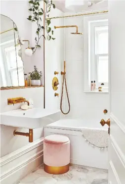  ??  ?? BATHROOM Marble tiles and brass fittings lend a luxe feel to the space, which benefits from natural light thanks to a new window.
Ambra brass hand-held shower and overhead shower, £933; Tradition shower valve, £1,397, all Aston Matthews