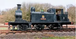  ?? JOHN FAULKNER ?? The boiler cladding being refitted to ‘E1’ 0-6-0T No. W2 Yarmouth at the Isle of Wight Steam Railway following the lifting of its boiler on November 8.