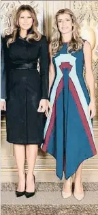  ?? ANDREA HANKS / EFE ?? Multicolor. En la recepción con el matrimonio Trump, la mujer de Sánchez lució un vestido de Delpozo24