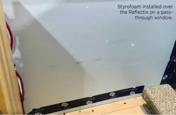  ??  ?? Styrofoam installed over the Reflectix on a passthroug­h window.