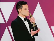  ?? FOTO REUTERS ?? Nejlepší herec. Rami Malek oceněný za roli Freddieho Mercuryho.