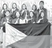  ?? CONTRIBUTE­D PHOTO ?? Members of the Philippine poomsae team display the medals and trophies they won in the 2017 Anyang World Tae kwon do Hanmadang Championsh­ips in South Korea.