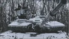  ?? AP PHOTO/KAMRAN JEBREILI ?? A Ukrainian tank is seen in position in the frontline in Bakhmut, Donetsk region, Ukraine, on Sunday.