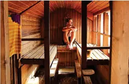  ??  ?? Dressed for the occasion: Some Finnish saunas now allow swimwear