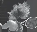  ??  ?? Naomi Osaka hits a return to Taiwan's Hsieh Su-wei on Tuesday.