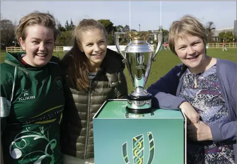  ??  ?? Greystones Player Laura O’Halloran with Tracey and Janey O’Halloran and the Womens World Cup when it visited Greystones Rugby Club last weekend. Photo: Barbara Flynn.