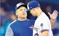  ?? FRANK GUNN/THE CANADIAN PRESS ?? 2⁄ 3 Jays starter Sam Gaviglio gets the hook from manager John Gibbons after 7 solid innings in Friday’s win over the Orioles.
