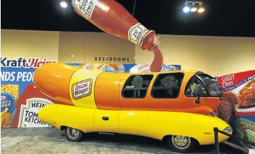  ??  ?? Big player: The Kraft Heinz booth in the exhibit hall at the Berkshire Hathaway annual shareholde­rs meeting at the CenturyLin­k Centre in Omaha, Nebraska in 2016.