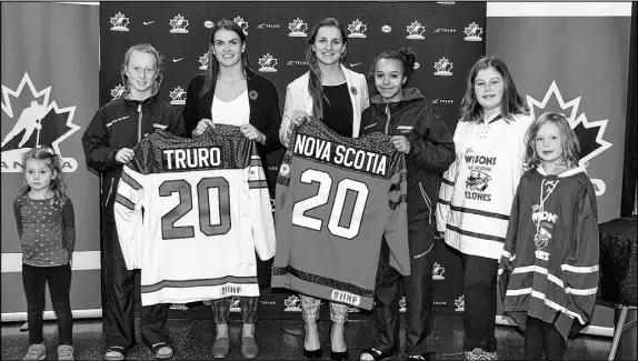  ?? HARRY SULLIVAN/TRURO NEWS ?? Several young females got to meet a couple of members of Canada’s national women’s hockey team during the recent announceme­nt that Truro and Halifax will be hosting the 2020 IIHF Women’s World Hockey Championsh­ip. From left are Mila Moore, Baillie Griffon, Blayre Turnbull, Jill Saulnier, Willa Evans, Addison Ritcey and Alex Ritcey.