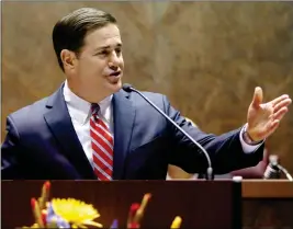  ?? ASSOCIATED PRESS ?? IN THIS JAN. 11, 2016, FILE PHOTO, Arizona Republican Gov. Doug Ducey presents his State of the State address in Phoenix. “We’re going to work to make sure we put more money into K-12 education every year I’m governor,’’ Ducey said in an interview with...