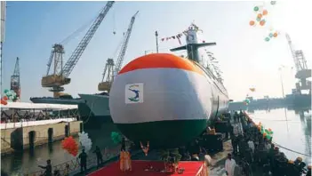  ?? PHOTOGRAPH: Indian Navy ?? Khanderi, the second of Indian Navy’s Scorpene class stealth submarine being launched