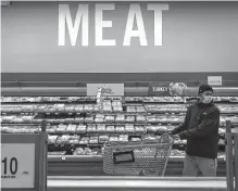  ?? Drew Angerer/getty Images ?? Meat industry experts say that beef, chicken and pork could become costlier in the United States because of rising costs and a tight labor market.