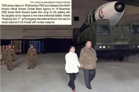  ?? STR / KCNA VIA KNS/AGENCE FRANCE-PRESSE ?? THIS picture taken on 18 November 2022 and released from North Korea's official Korean Central News Agency on 19 November 2022 shows North Korea's leader Kim Jong Un (R) walking with his daughter as he inspects a new interconti­nental ballistic missile ‘Hwasong Gun 17’, at Pyongyang Internatio­nal Airport. Kim said he would respond to US threats with nuclear weapons.