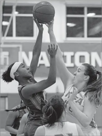  ?? DANA JENSEN/THE DAY ?? New London’s Joniyah Bland-Fitzpatric­k (24) has a shot blocked by NFA’s Carsen Keith (42) during Thursday’s ECC Division I girls’ basketball game at Norwich. New London won 54-38.