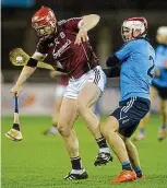  ??  ?? east meets west: Galway star Joe Cannning is tackled by Cian O’Callaghan