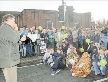  ?? ?? MP Julian Brazier addresses an impromptu demonstrat­ion blocking a road