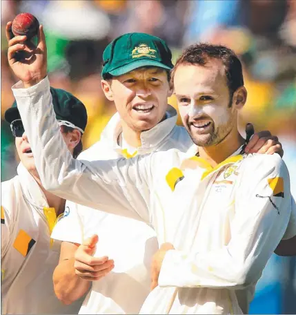  ?? Picture: WAYNE LUDBEY ?? Nathan Lyon raises the ball after securing five wickets in England’s second innings