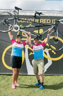  ??  ?? left Myka Osinchuk with husband Scott at the Alberta Ride to Conquer Cancer