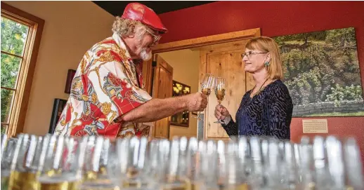  ?? Photos by Carlos Javier Sanchez / Contributo­r ?? Paul Bonarrgio, left, Messina Hof cofounder and Texas wine pioneer, had a wine beat out the French in a “Texas-French Shootout” in the early 1990s.