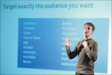  ?? Craig Ruttle Associated Press ?? FACEBOOK CEO Mark Zuckerberg in 2007 announces the company’s plans to let companies target their ads to specific users based on their interests. Such interests might include a neo-Nazi punk band or Josef Mengele.