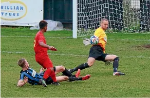  ?? PHOTO: MICHAEL WELSH ?? Miramar Rangers goalkeeper Phil Imray makes a save against Tawa in the Chatham Cup on Saturday.