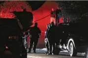  ?? RAY CHAVEZ / EAST BAY TIMES ?? Contra Costa County Sheriff deputies investigat­e in Orinda, California, Thursday after a shooting at a Halloween night party at an Airbnb rental home. The death toll was raised to five Friday night.