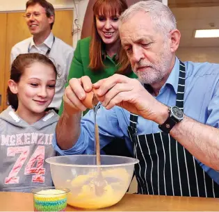  ??  ?? Egg on his face: Jeremy Corbyn and Angela Rayner at a youth club yesterday
