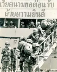  ??  ?? Troops of the Royal Thai Army’s Black Panther Division disembark from a landing craft at Saigon’s new port on Feb 1, 1969.